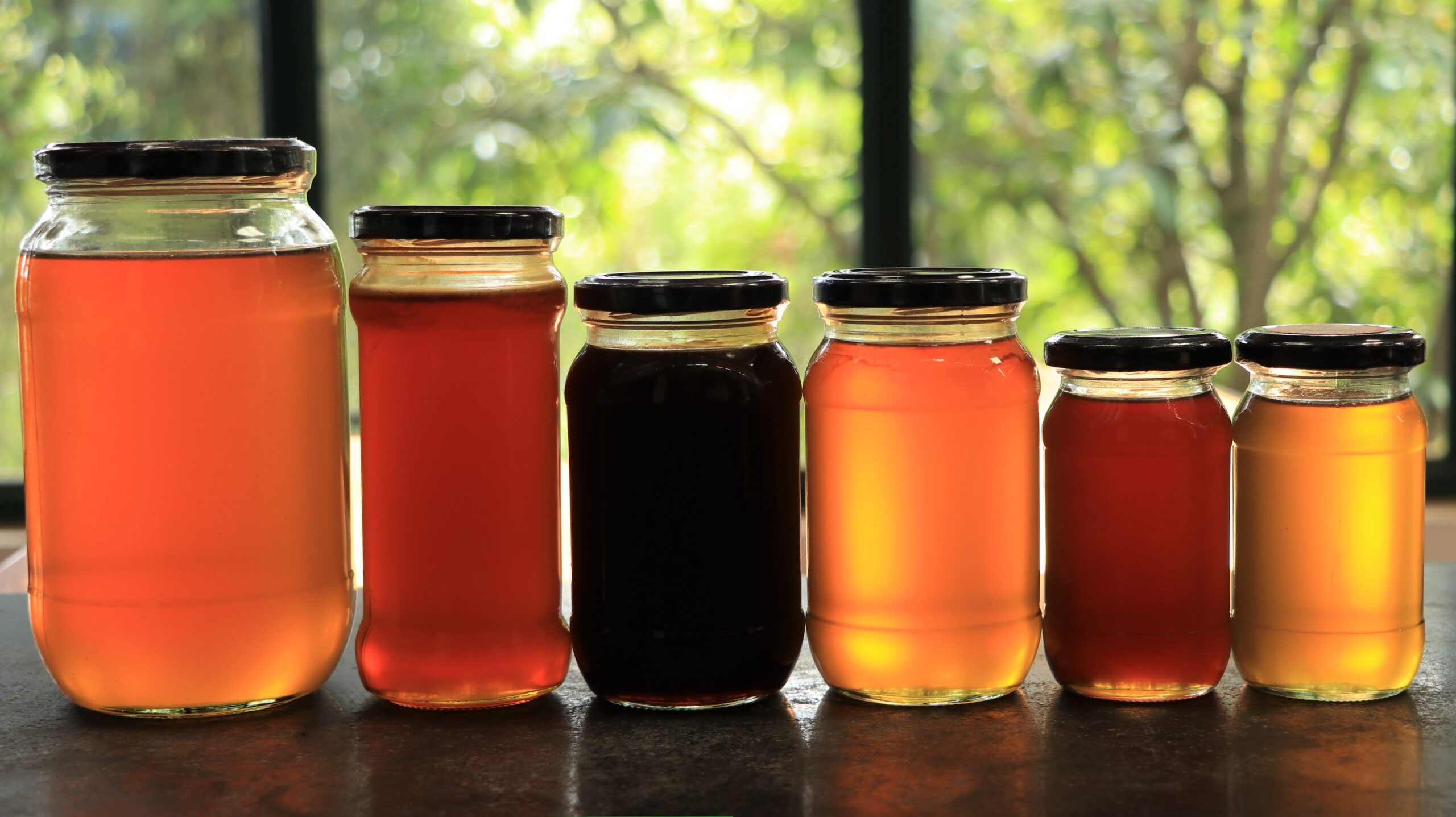 A row of honey jars